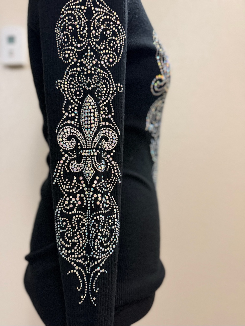 Vocal Black V-Neck Sweater with Rhinestone Fleur-de-Lis Accent - Picture 5 of 7